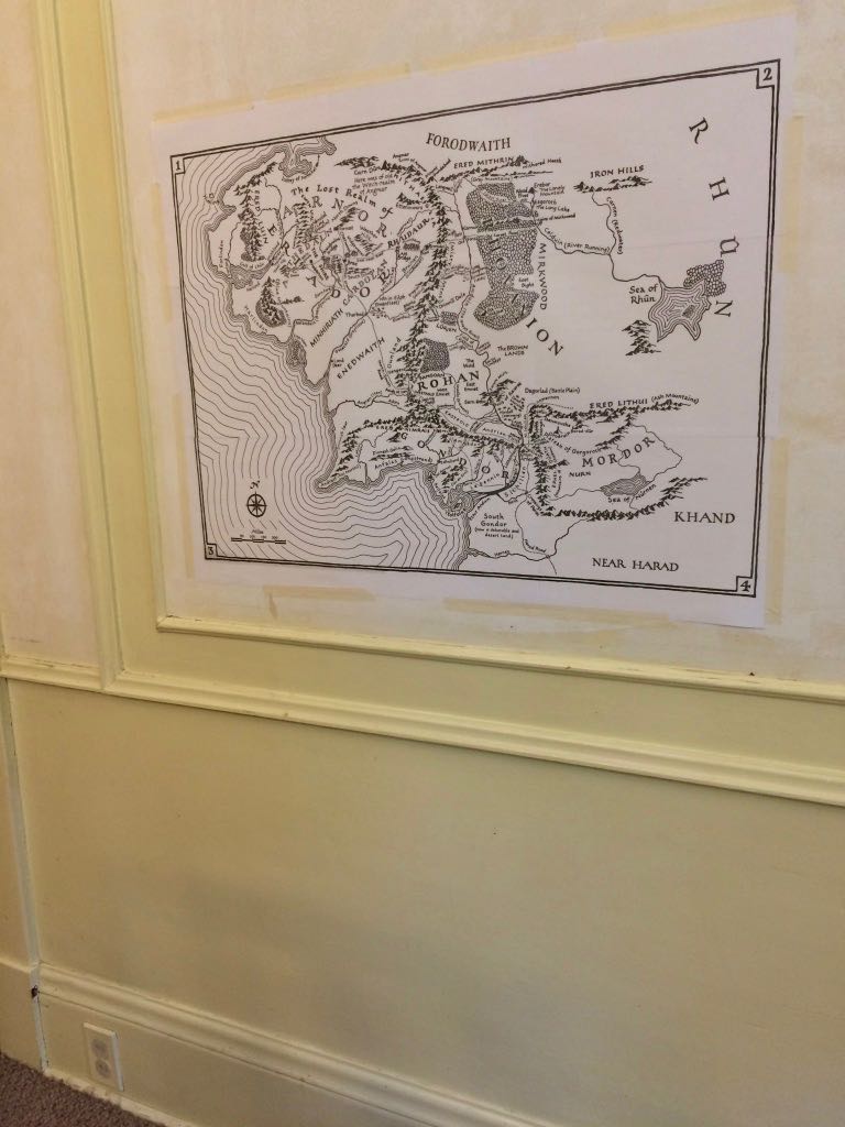 Photo of large Middle-earth map taped 
			       to the wall: taped together from 3x3 
			       letter-sized sheets.